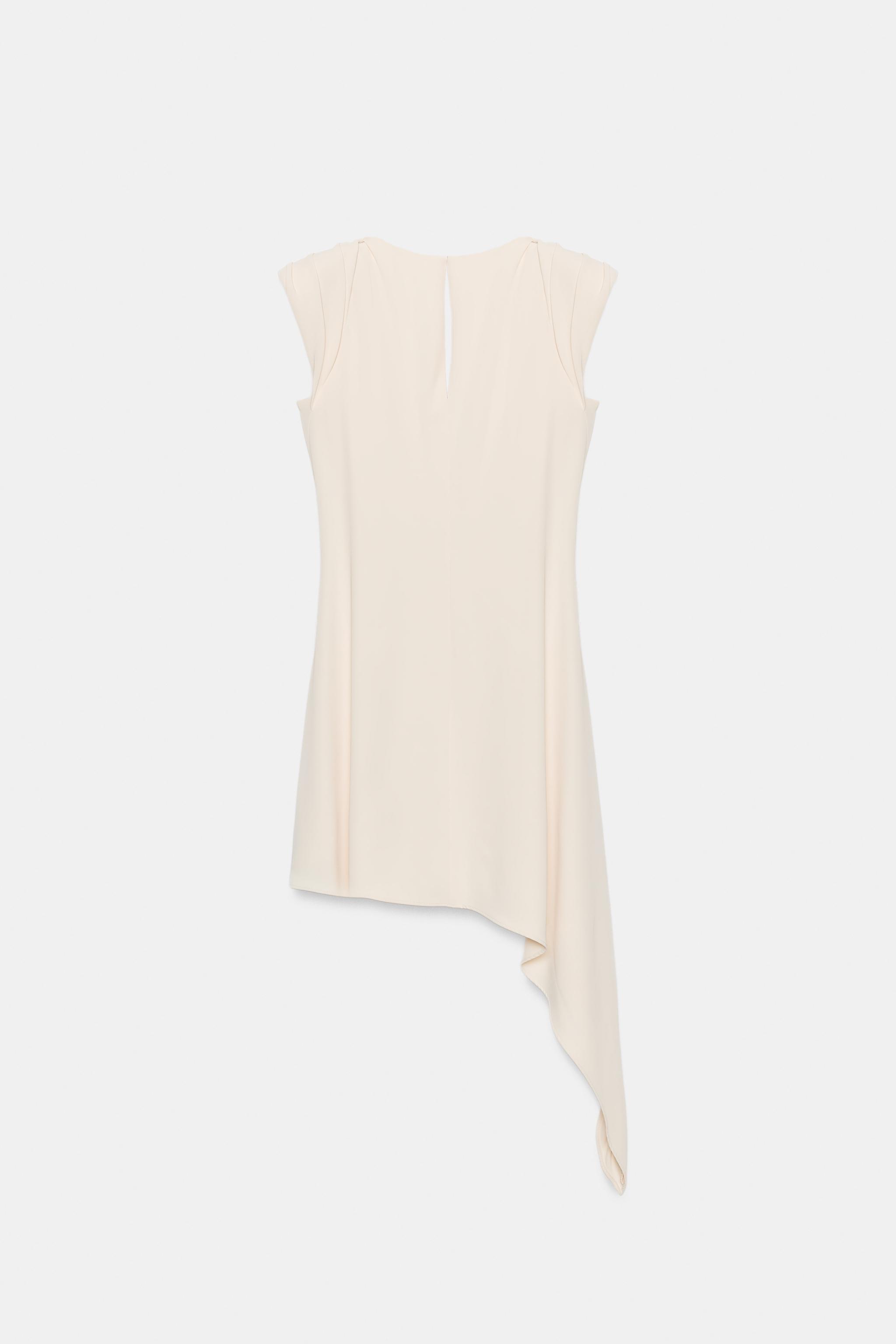 ASYMMETRIC SHORT DRESS WITH SHOULDER PADS